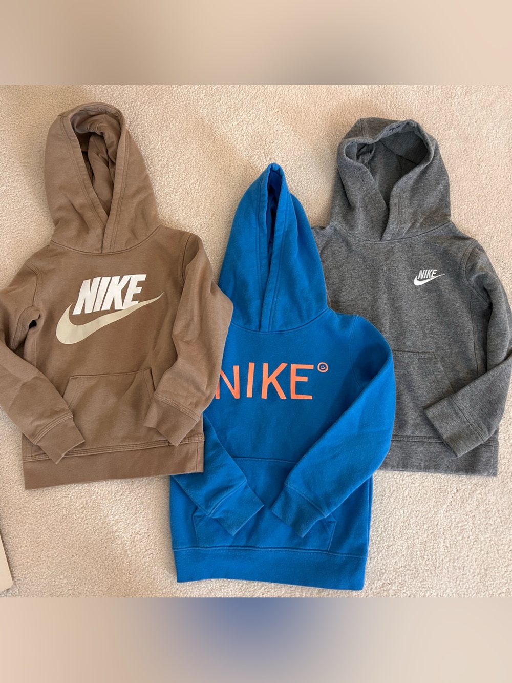 Nike Kids Hoodies Trio in Brown, Blue, and Gray